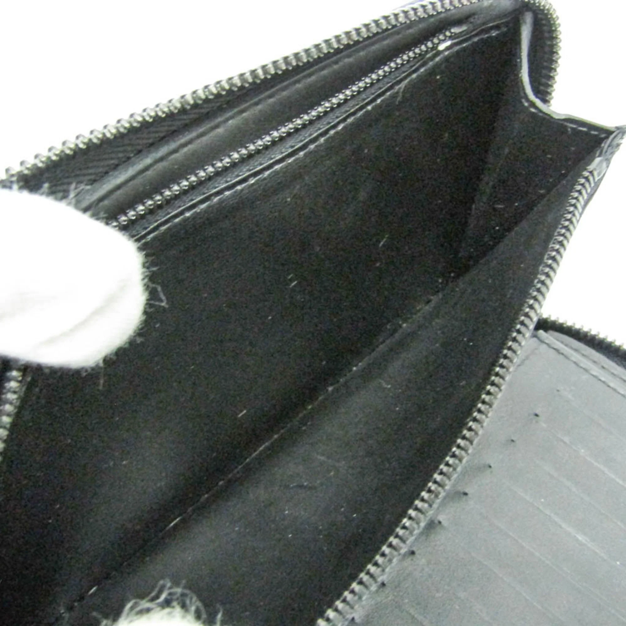 Zippy Wallet Monogram Shadow Leather Vertical - Image 9